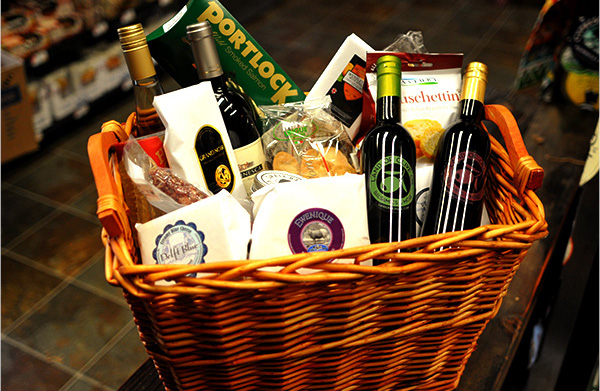 Gift basket with an assortment of cheeses and oils